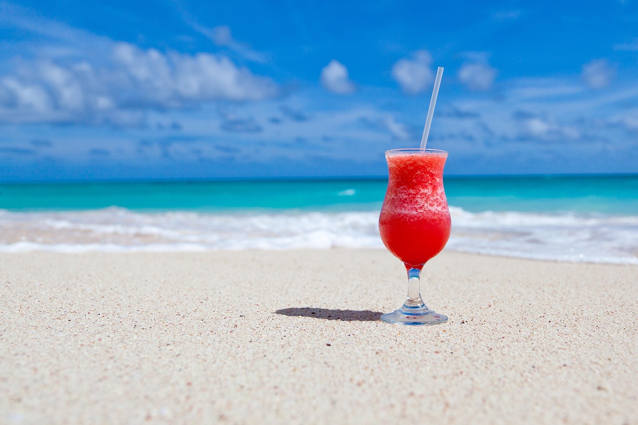 drink, cocktail, beach, beverage, refreshment, alcoholic drink, alcoholic beverage, glass, nature, coast, sand, shore, seashore, paradise, tropical, caribbean sea, caribbean